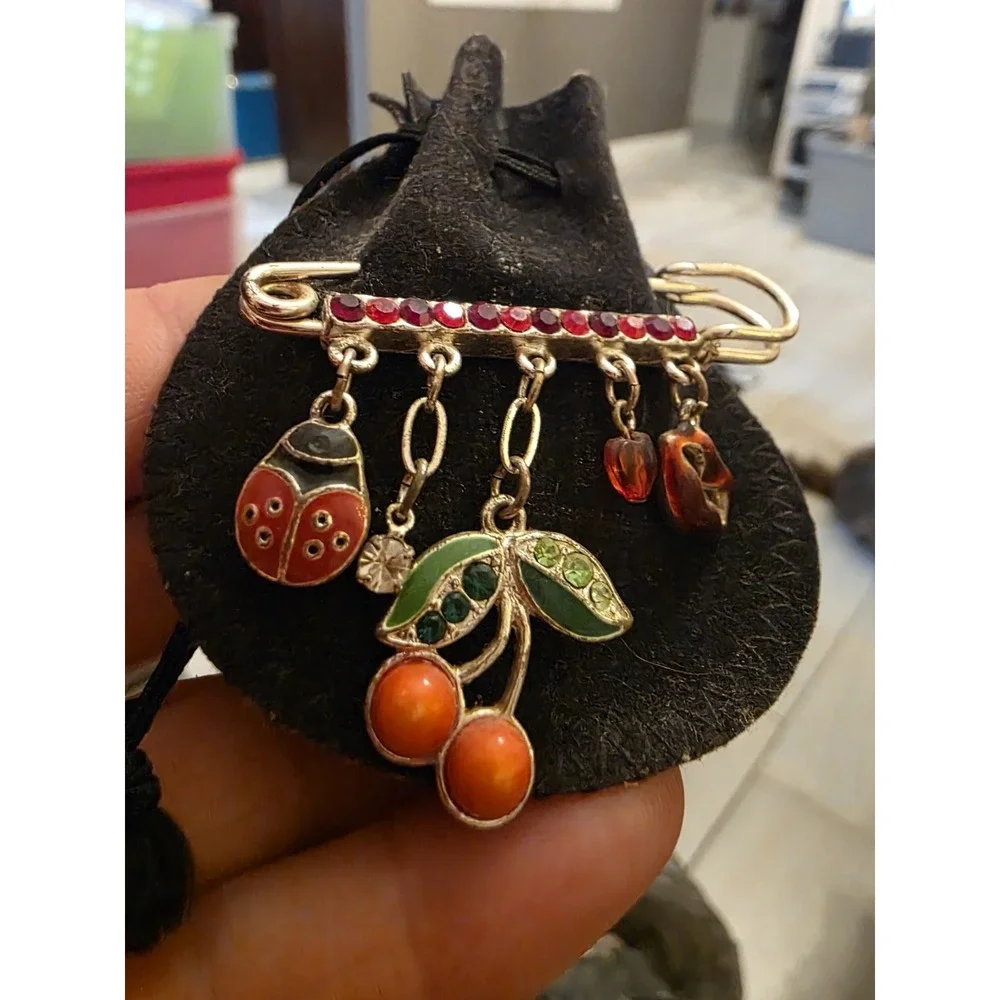 Avon charming pin